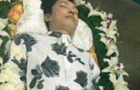 乔任梁遗照为什么没有左臂，乔任梁是怎么死的